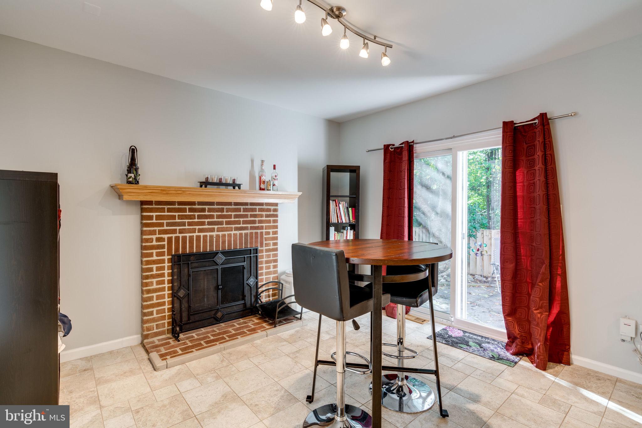 7909 Treeside Court Springfield, VA 22152 - Photo 14 of 35 Eat in area has sliding door out to patio