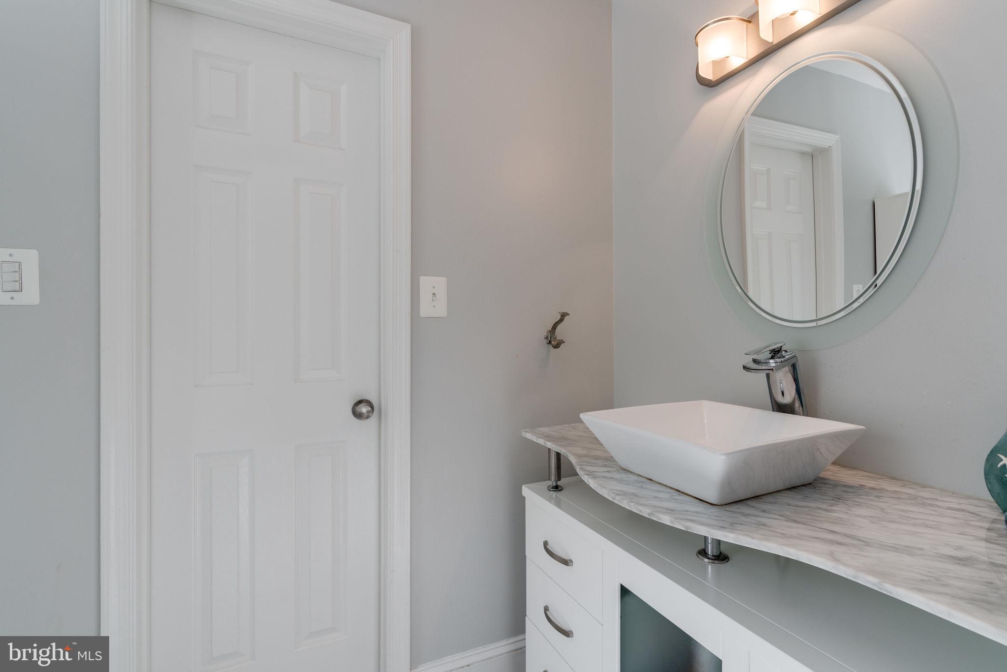 7909 Treeside Court Springfield, VA 22152 - Photo 21 of 35 Updated primary bathroom w/walk in closet