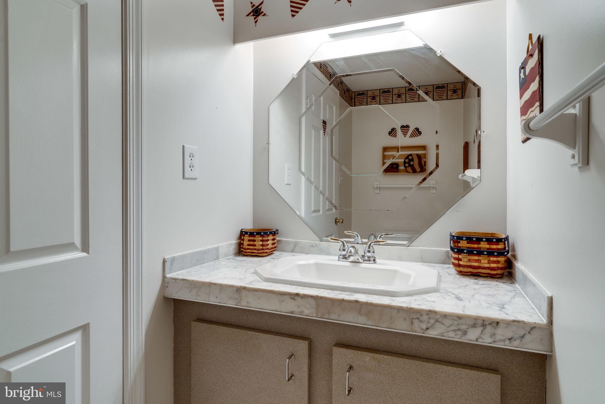 7909 Treeside Court Springfield, VA 22152 - Photo 29 of 35 Half bathroom on lower level