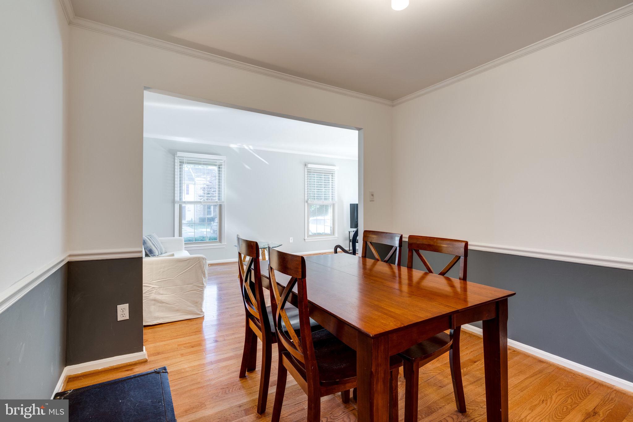 7909 Treeside Court Springfield, VA 22152 - Photo 10 of 35 Dining room opens to living room