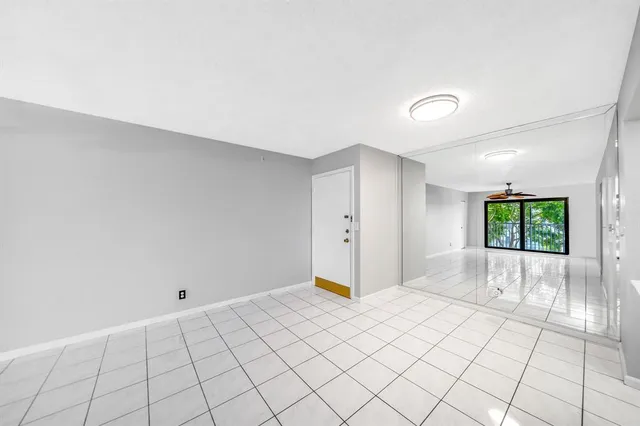 a view of an empty room and window