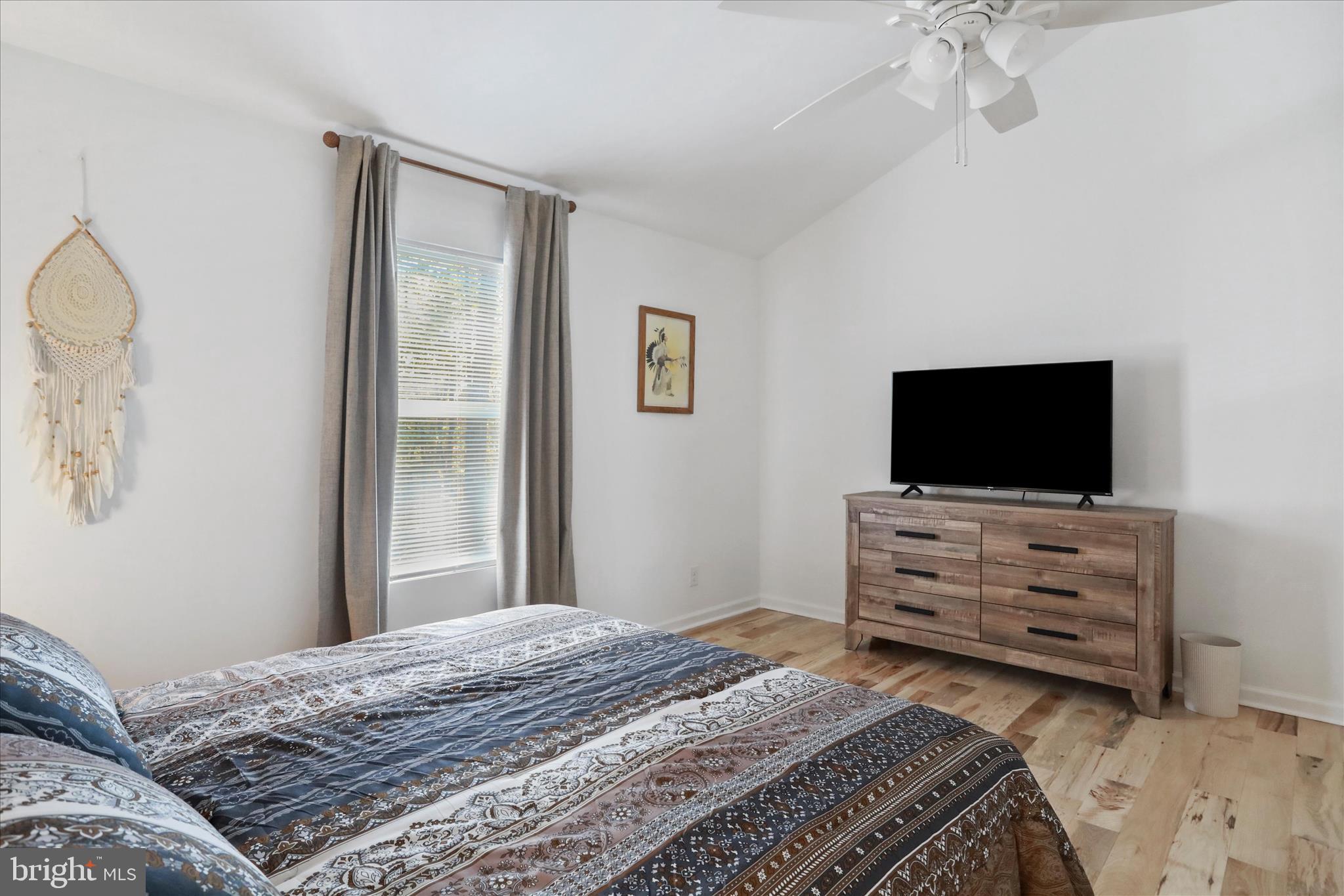 598 Crabapple Road Mount Jackson, VA 22842 - Photo 7 of 32 a bedroom with a bed and a flat screen tv