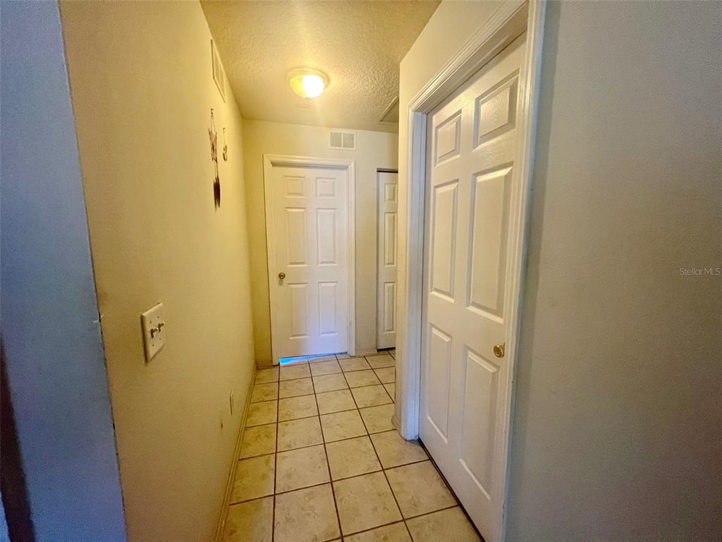 122 Ullian Trail, Unit A&B Palm Coast, FL 32164 - Photo 21 of 32 a bathroom with a shower