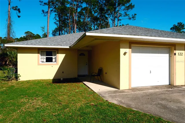 a front view of house with yard