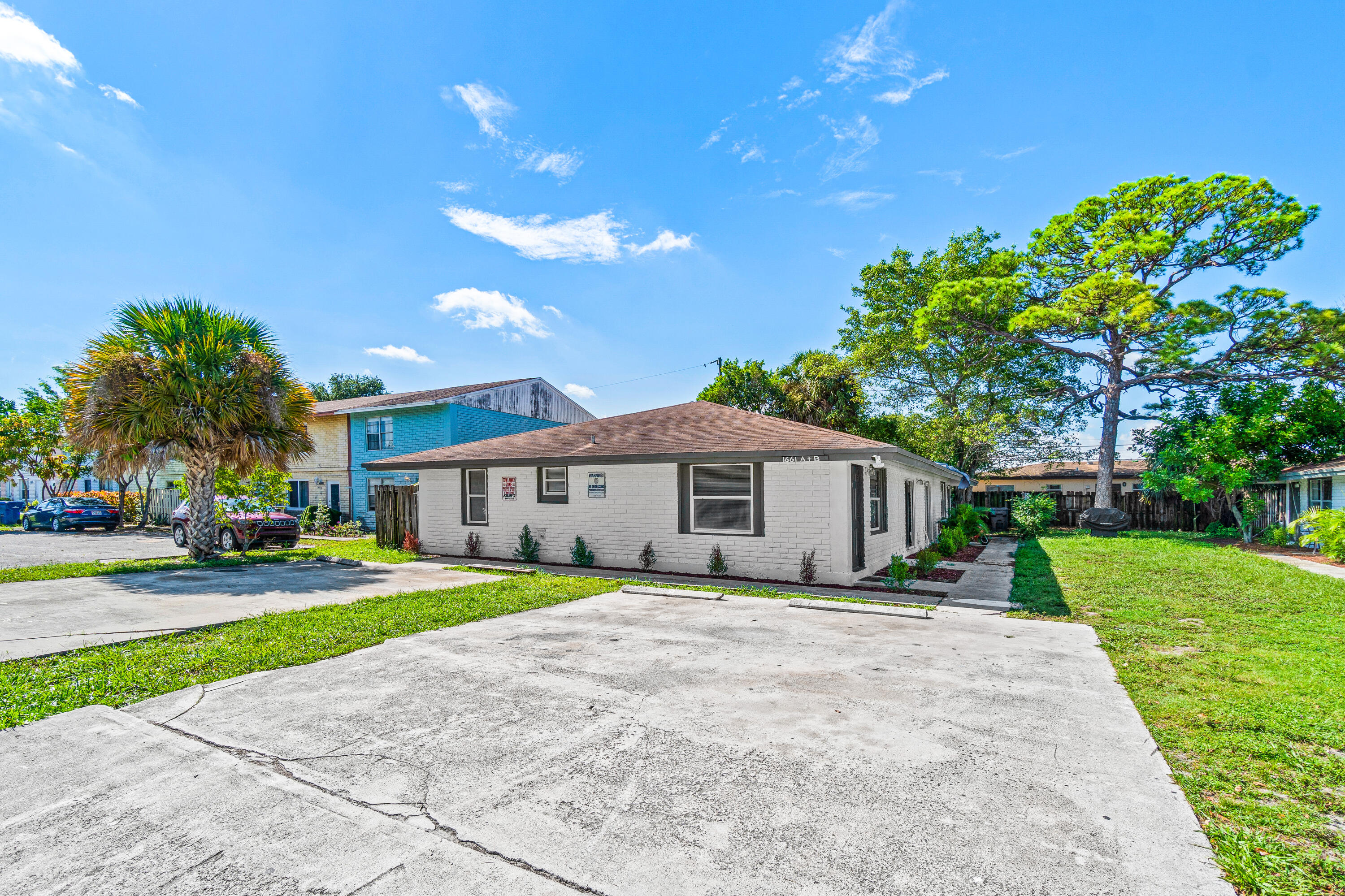 1661 West 27th Street, Unit A & B Riviera Beach, FL 33404 - Photo 2 of 19 front