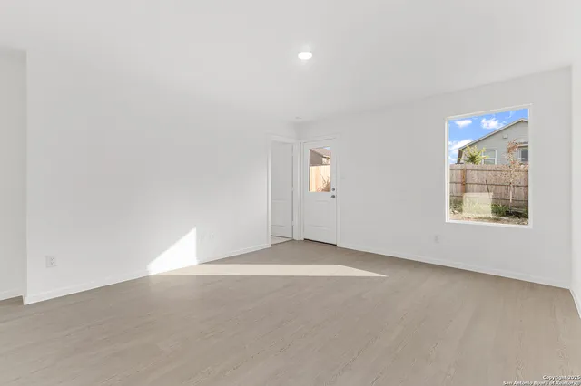 an empty room with windows