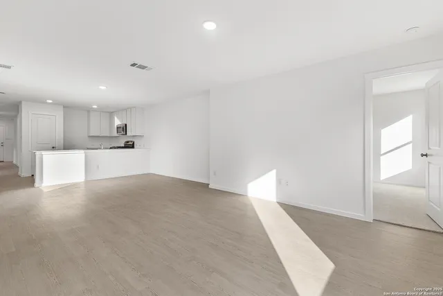 a view of kitchen with wooden floor