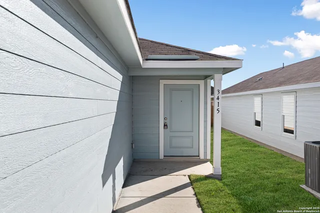 a backyard of a house with lots of green space