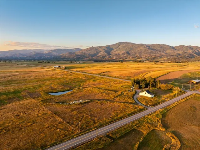 a view of an ocean and a mountain