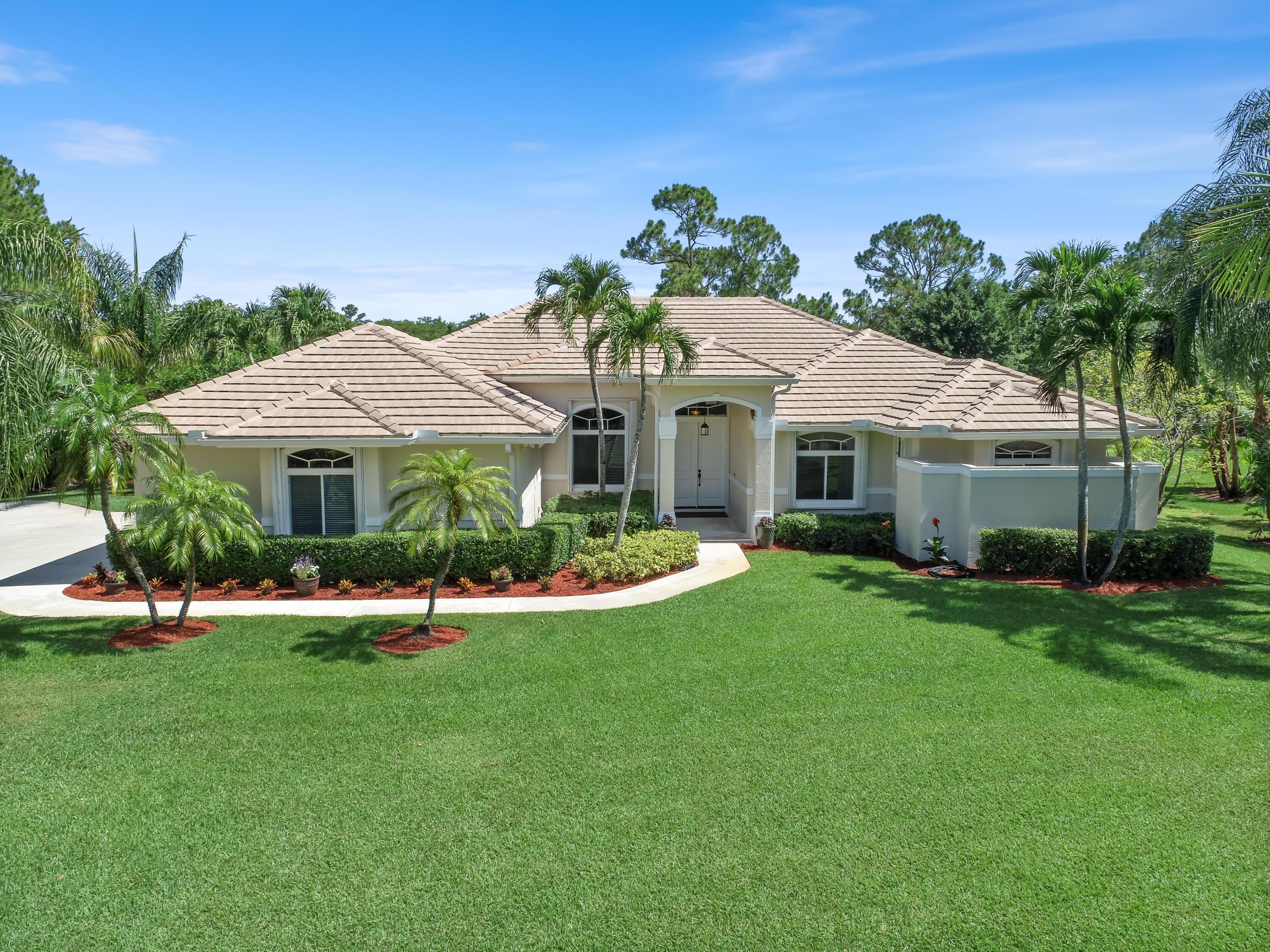 1440 Southeast Colony Way Jupiter, FL 33478 - Photo 2 of 57 Front