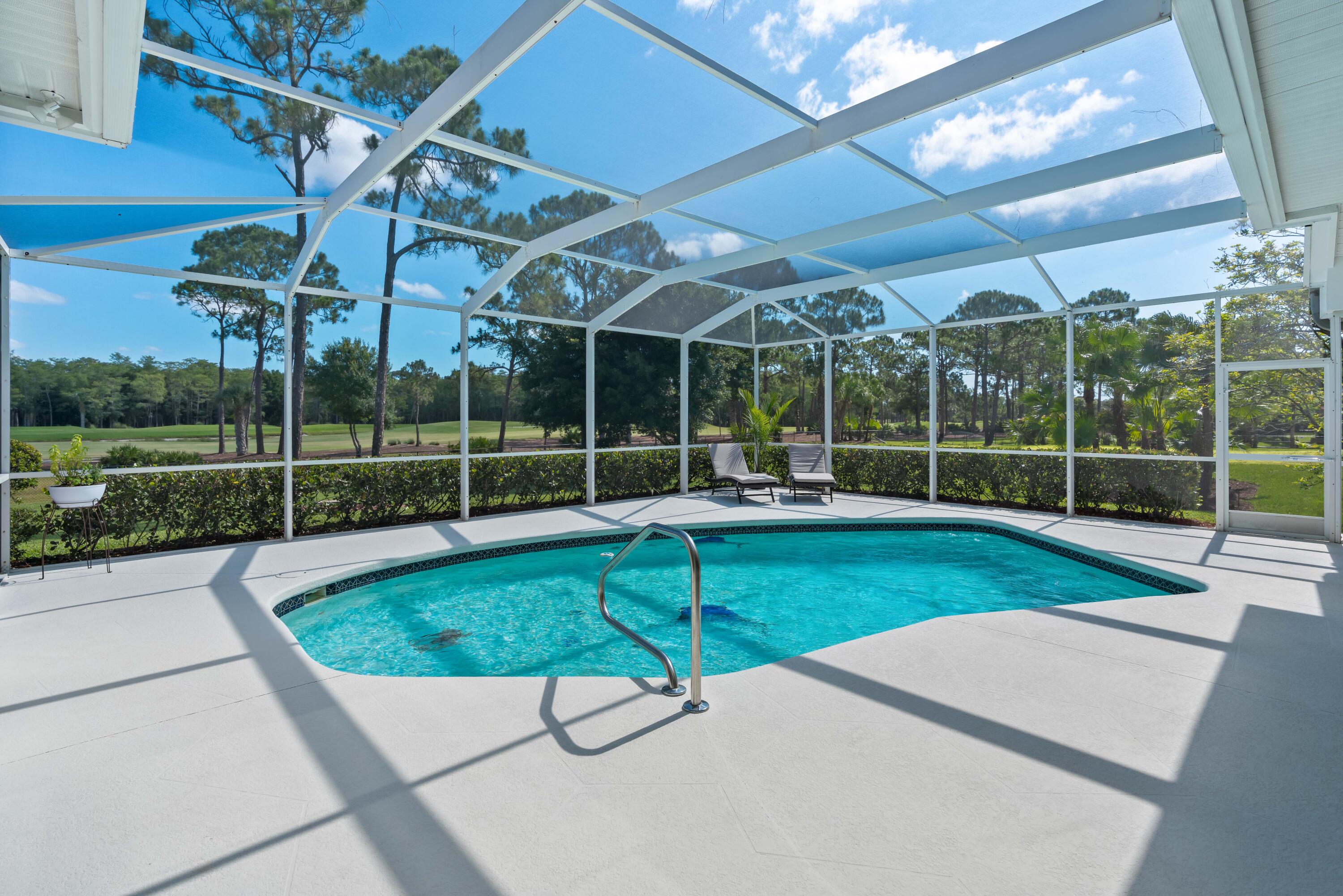 1440 Southeast Colony Way Jupiter, FL 33478 - Photo 4 of 57 Pool Area Overlooking Golf Course