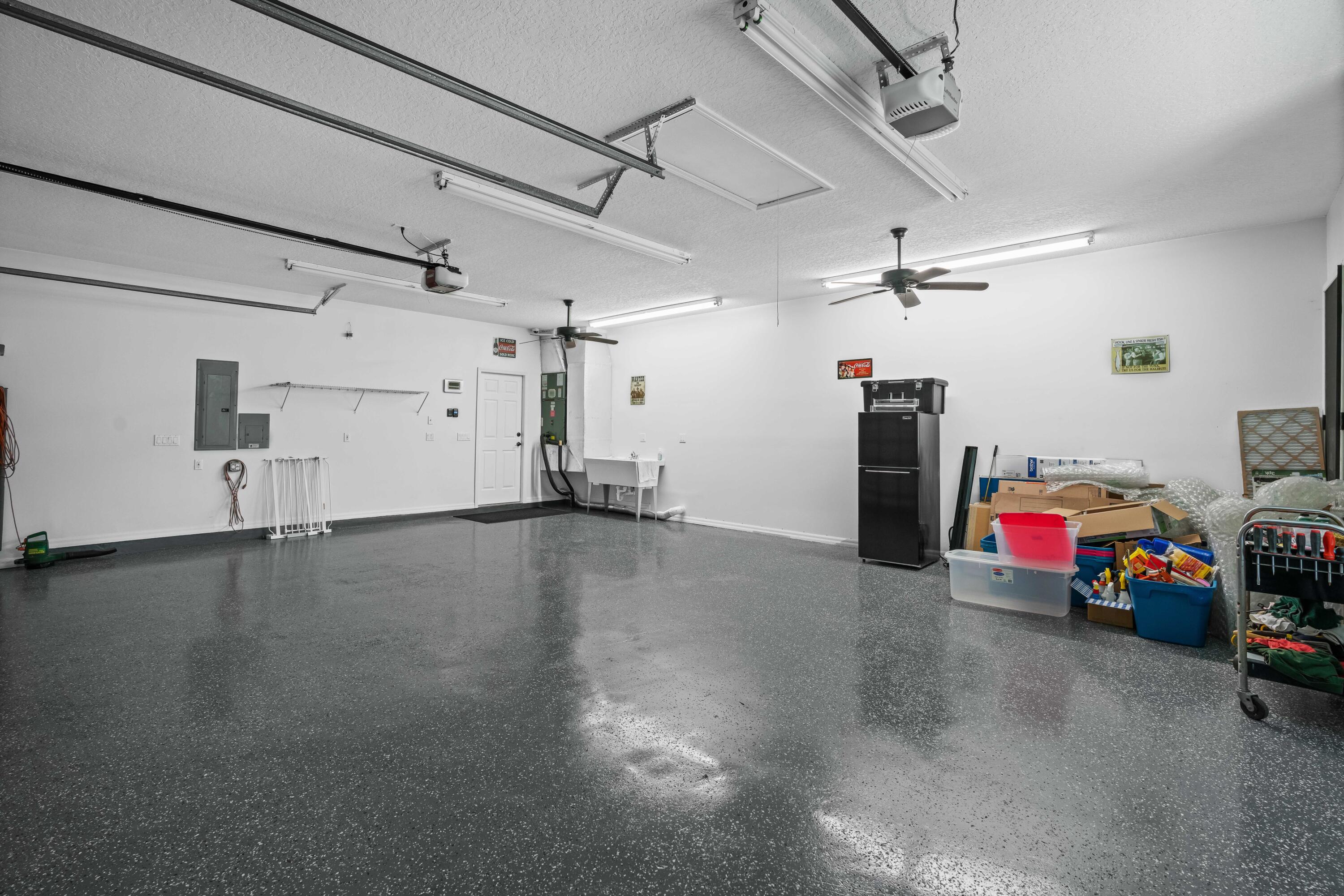 1440 Southeast Colony Way Jupiter, FL 33478 - Photo 8 of 57 3 Car Garage