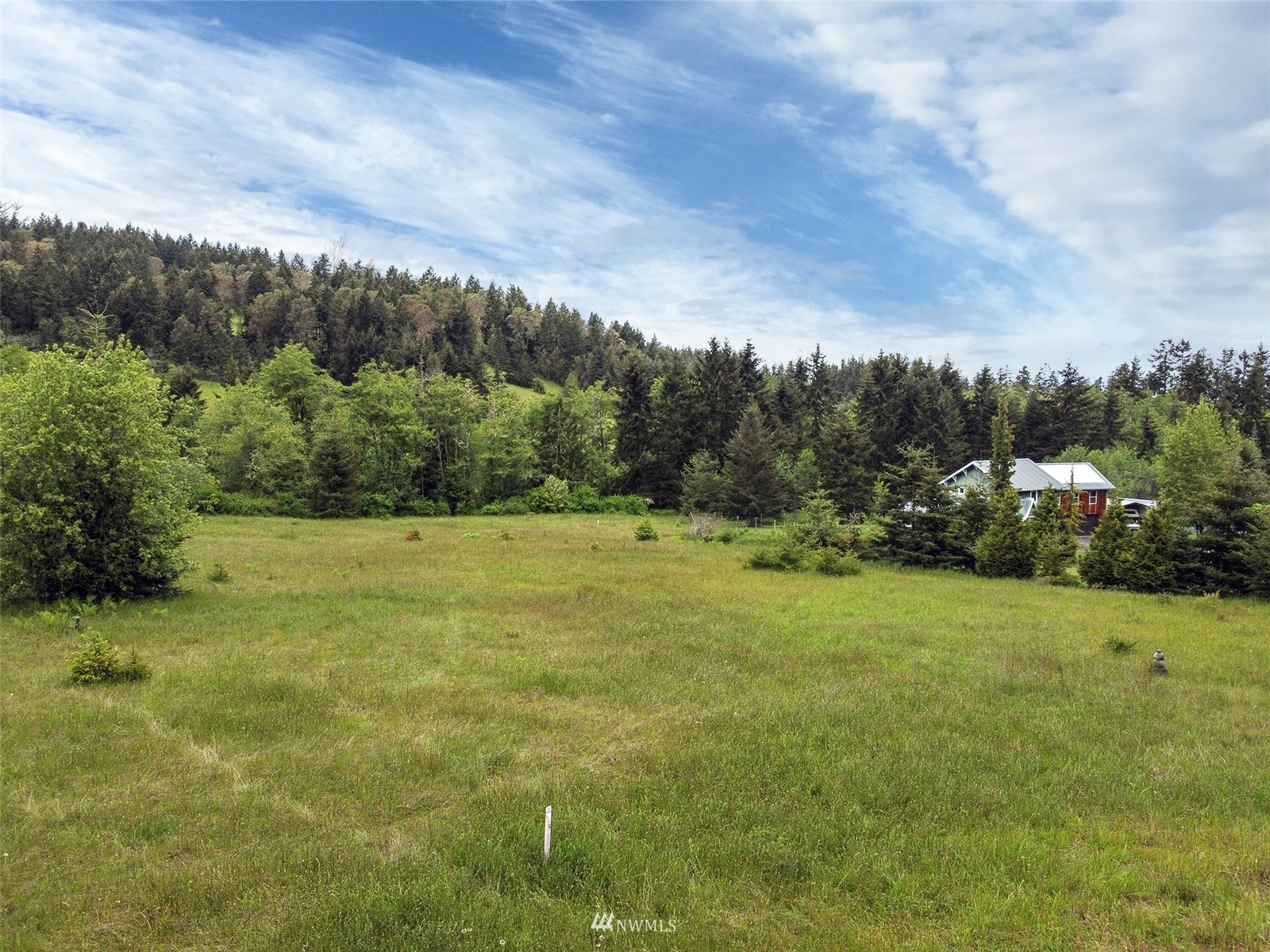-xx Happy Valley Road Sequim, WA 98382 - Photo 5 of 8 a view of a big yard with swimming pool and green space