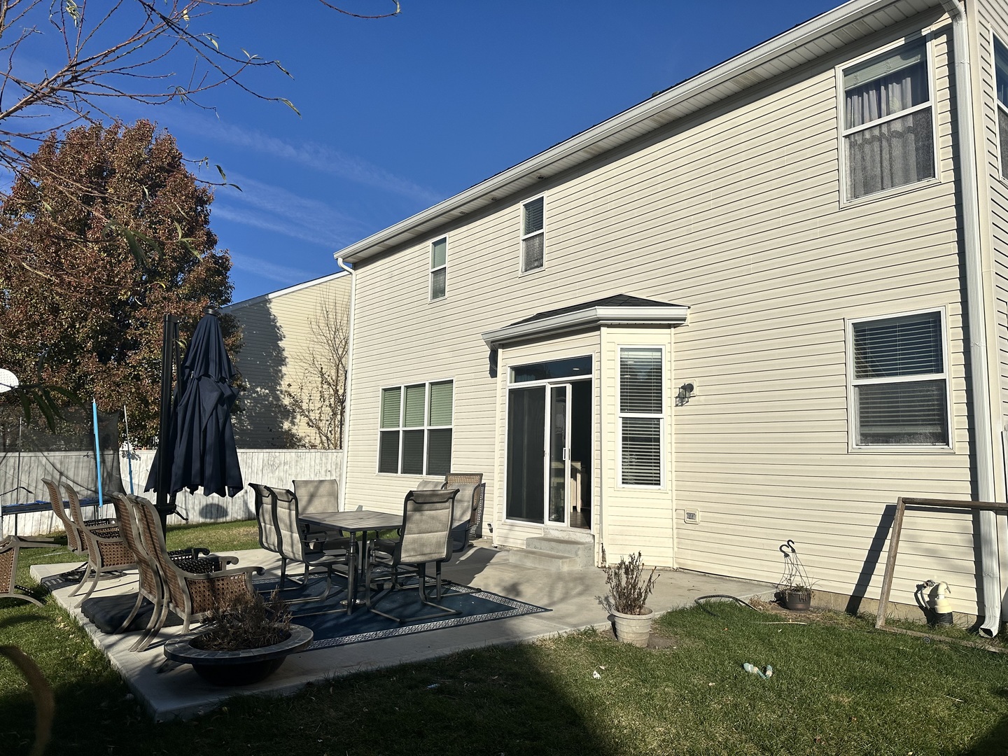 1313 Roth Drive Joliet, IL 60431 - Photo 16 of 22 a backyard of a house with outdoor seating