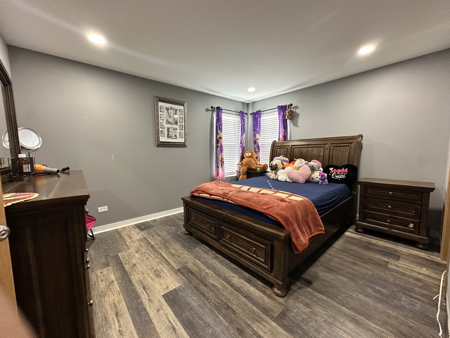 1313 Roth Drive Joliet, IL 60431 - Photo 17 of 22 a bedroom with a bed and wooden floor
