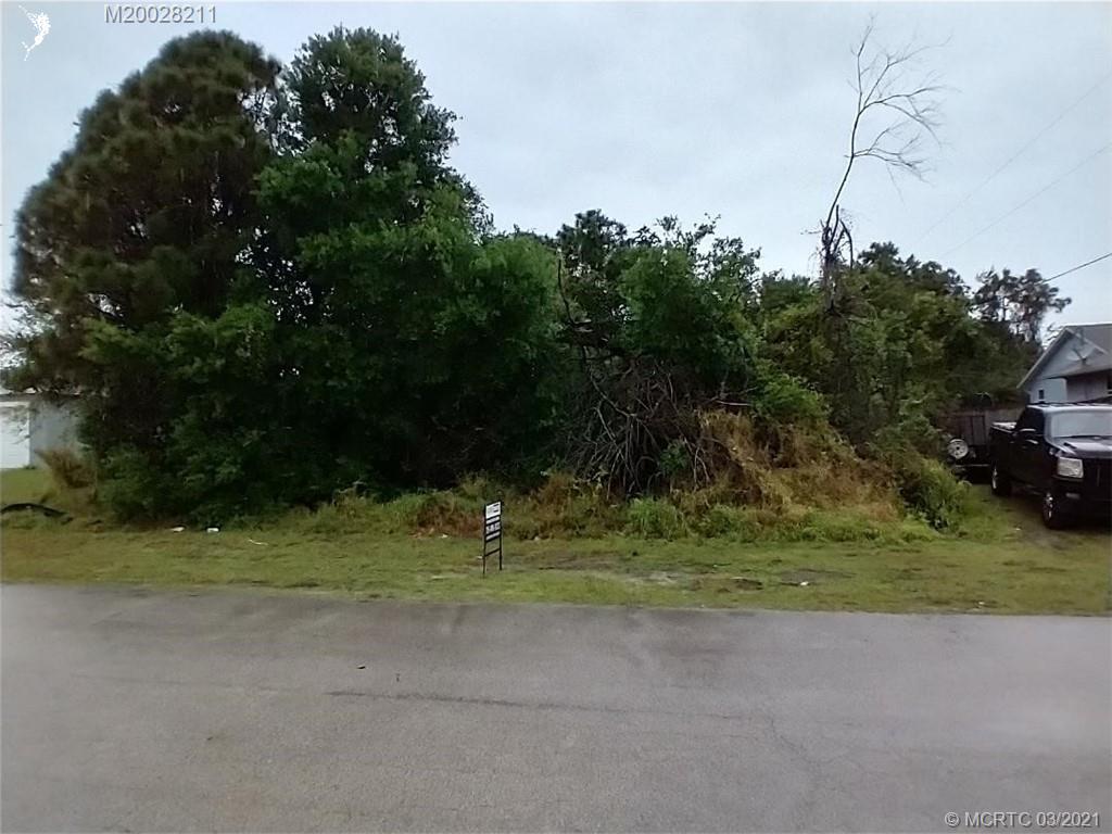 779 Southwest Bond Road Port St. Lucie, FL 34953 - Photo 2 of 3 Wooded lot with homes built on each side. Nice location, close to Turnpike and 95.