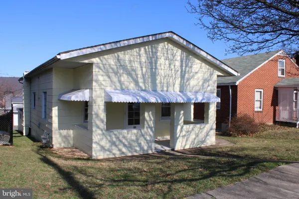 a front view of a house with a porch