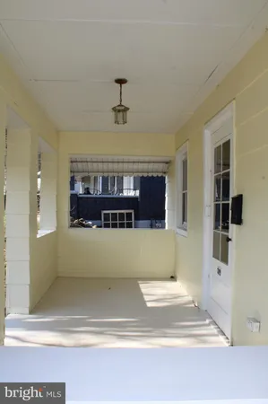 a view of room with a ceiling fan