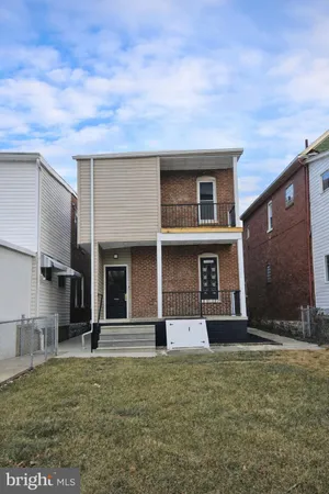 a front view of house with yard