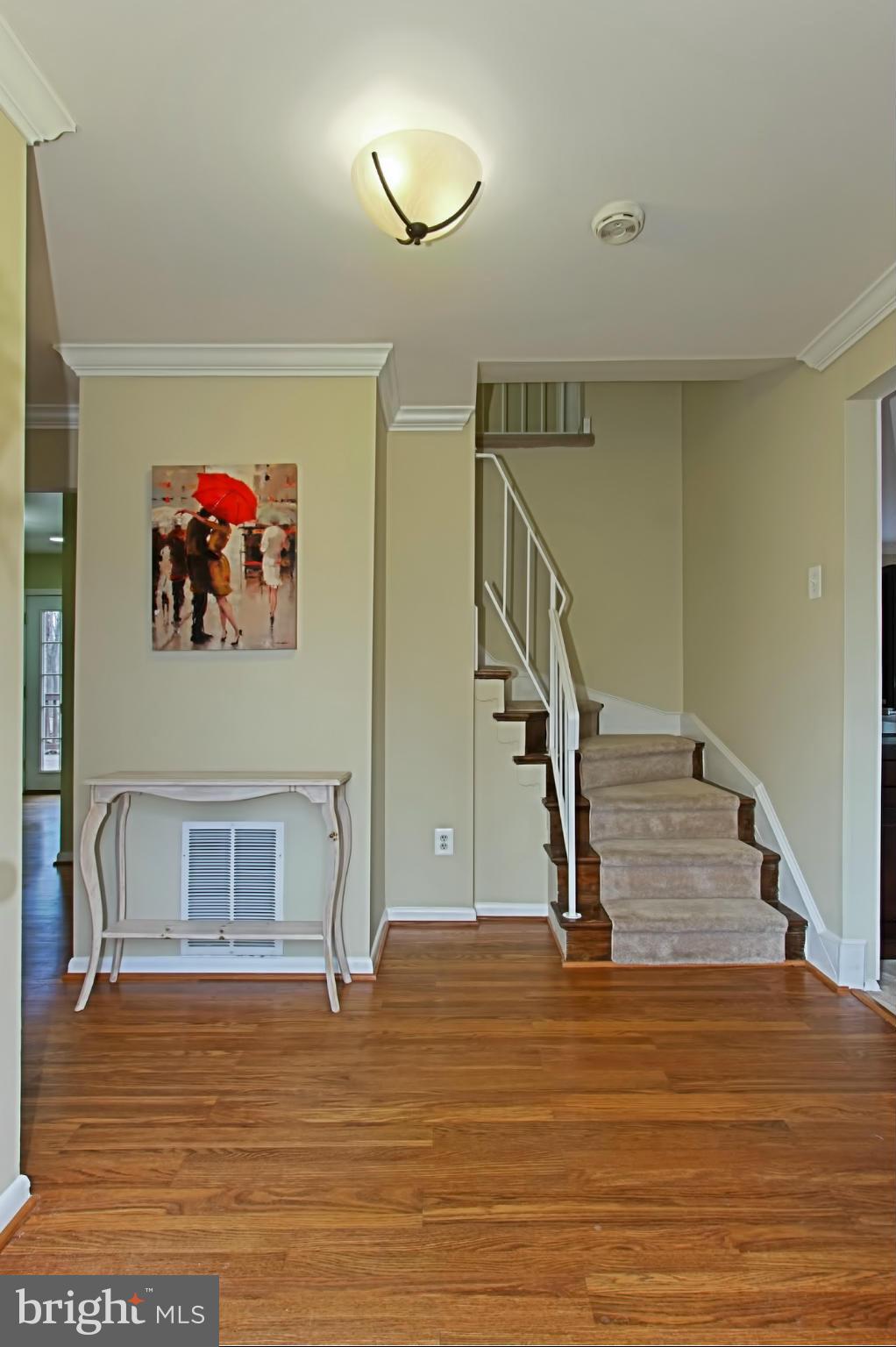 12404 Melmark Court Reston, VA 20191 - Photo 21 of 28 Lovely Open Foyer with Hardwood Floors