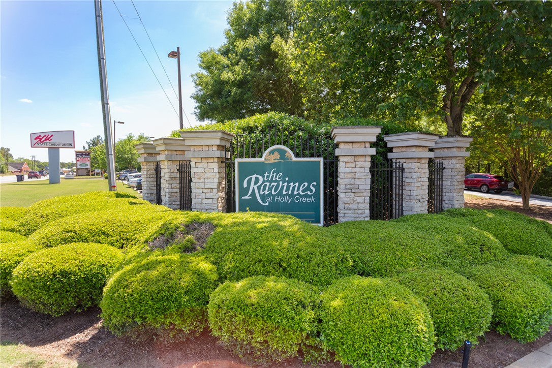 155 Life Style Lane Anderson, SC 29621 - Photo 44 of 49 Welcome to a thriving community with manicured landscaping, inviting residents and guests alike.