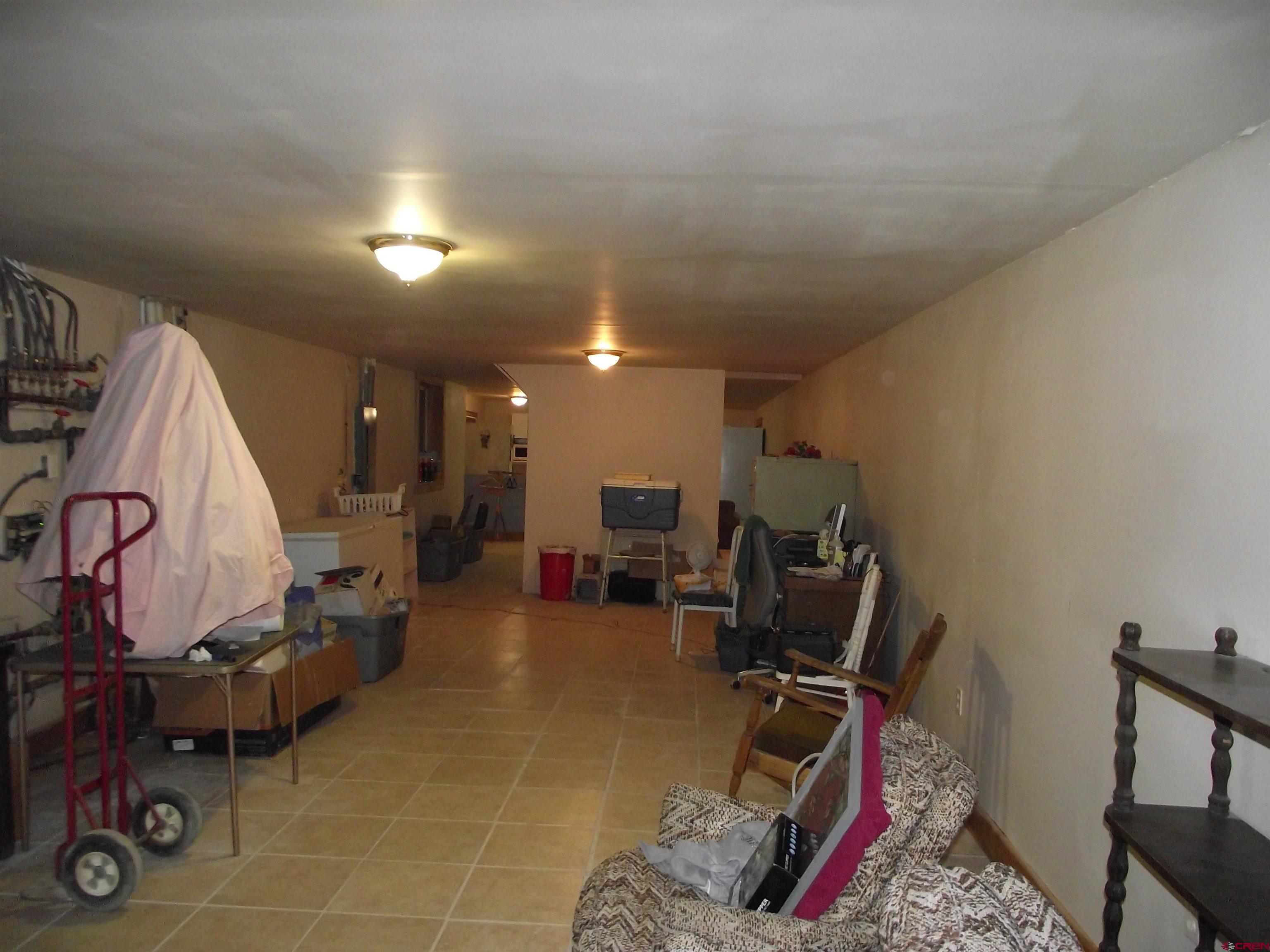 6742 2200th Road Delta, CO 81416 - Photo 37 of 45 a view of a room with gym equipment