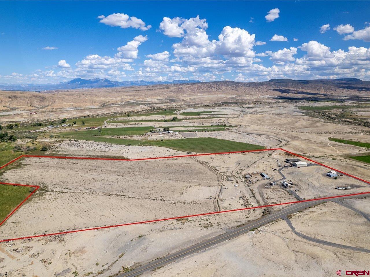 6742 2200th Road Delta, CO 81416 - Photo 8 of 45 a view of a lake with beach