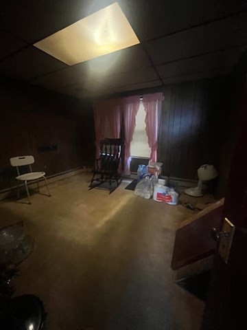 75 Winthrop Street Woonsocket, RI 02895 - Photo 11 of 30 a room with furniture and a projector screen