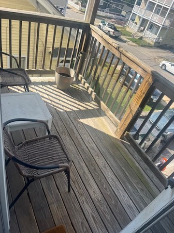 75 Winthrop Street Woonsocket, RI 02895 - Photo 13 of 30 a view of balcony with wooden floor