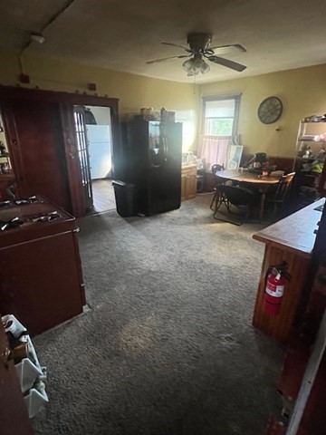 75 Winthrop Street Woonsocket, RI 02895 - Photo 20 of 30 a living room with furniture and a window