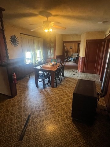 75 Winthrop Street Woonsocket, RI 02895 - Photo 29 of 30 a living room with furniture and a piano