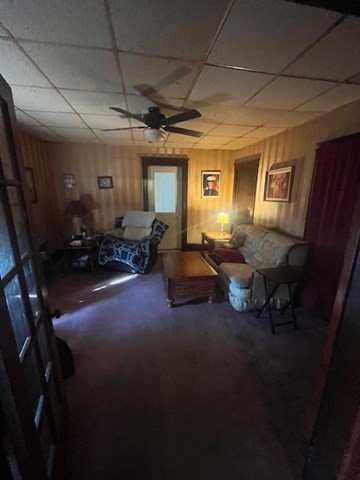 75 Winthrop Street Woonsocket, RI 02895 - Photo 30 of 30 a living room with furniture and a window