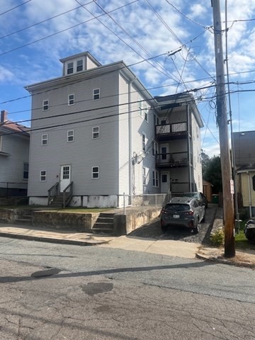 75 Winthrop Street Woonsocket, RI 02895 - Photo 3 of 30 a view of the entrance gate of the house