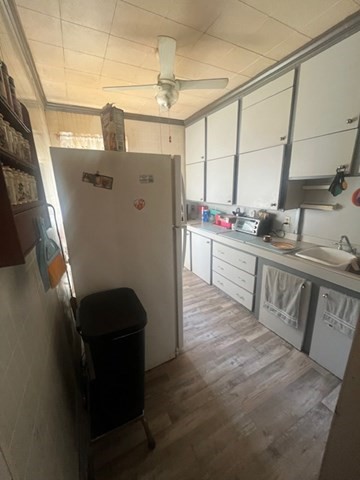 75 Winthrop Street Woonsocket, RI 02895 - Photo 10 of 30 a kitchen with stainless steel appliances a refrigerator and a sink