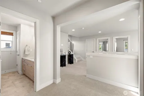 wooden floor in an empty room and a kitchen