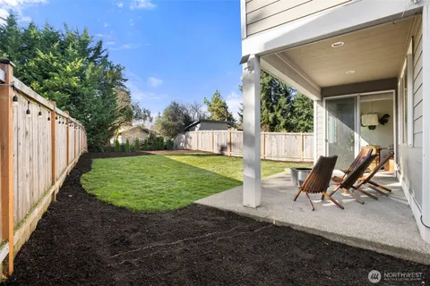a view of a couches in backyard of the house