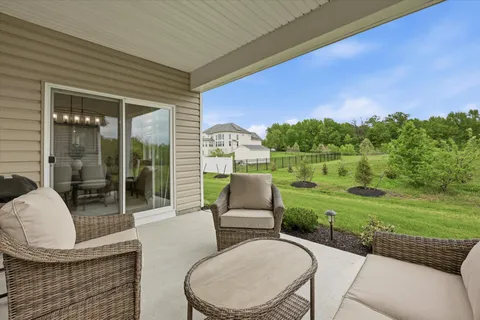 a house that has a big yard in front of it