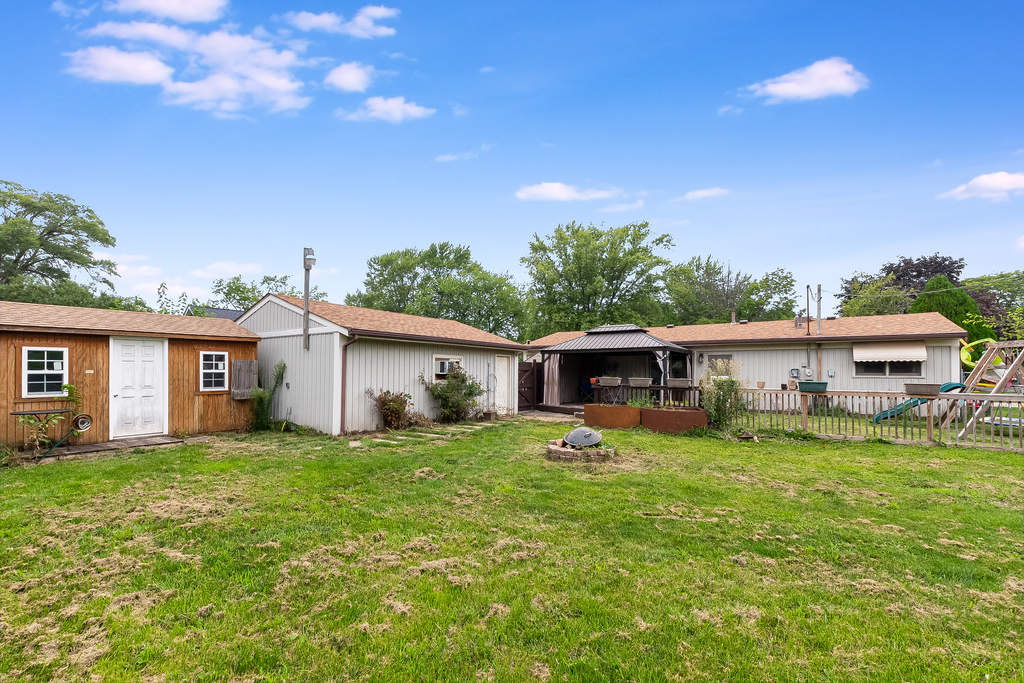26 Saugatuck Road Montgomery, IL 60538 - Photo 14 of 15 front view of a house and a yard