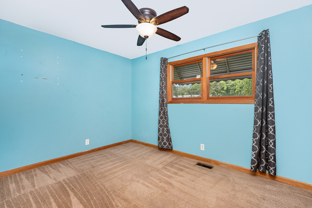 26 Saugatuck Road Montgomery, IL 60538 - Photo 6 of 15 an empty room with a window