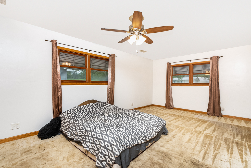 26 Saugatuck Road Montgomery, IL 60538 - Photo 9 of 15 a bedroom with a bed and window