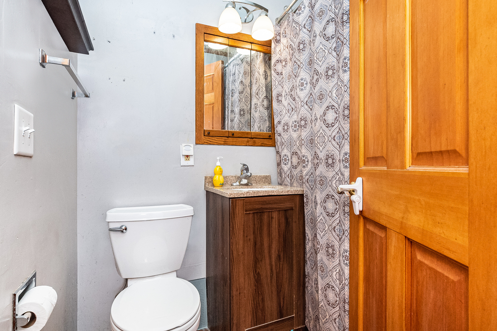 26 Saugatuck Road Montgomery, IL 60538 - Photo 10 of 15 a bathroom with a toilet sink and mirror