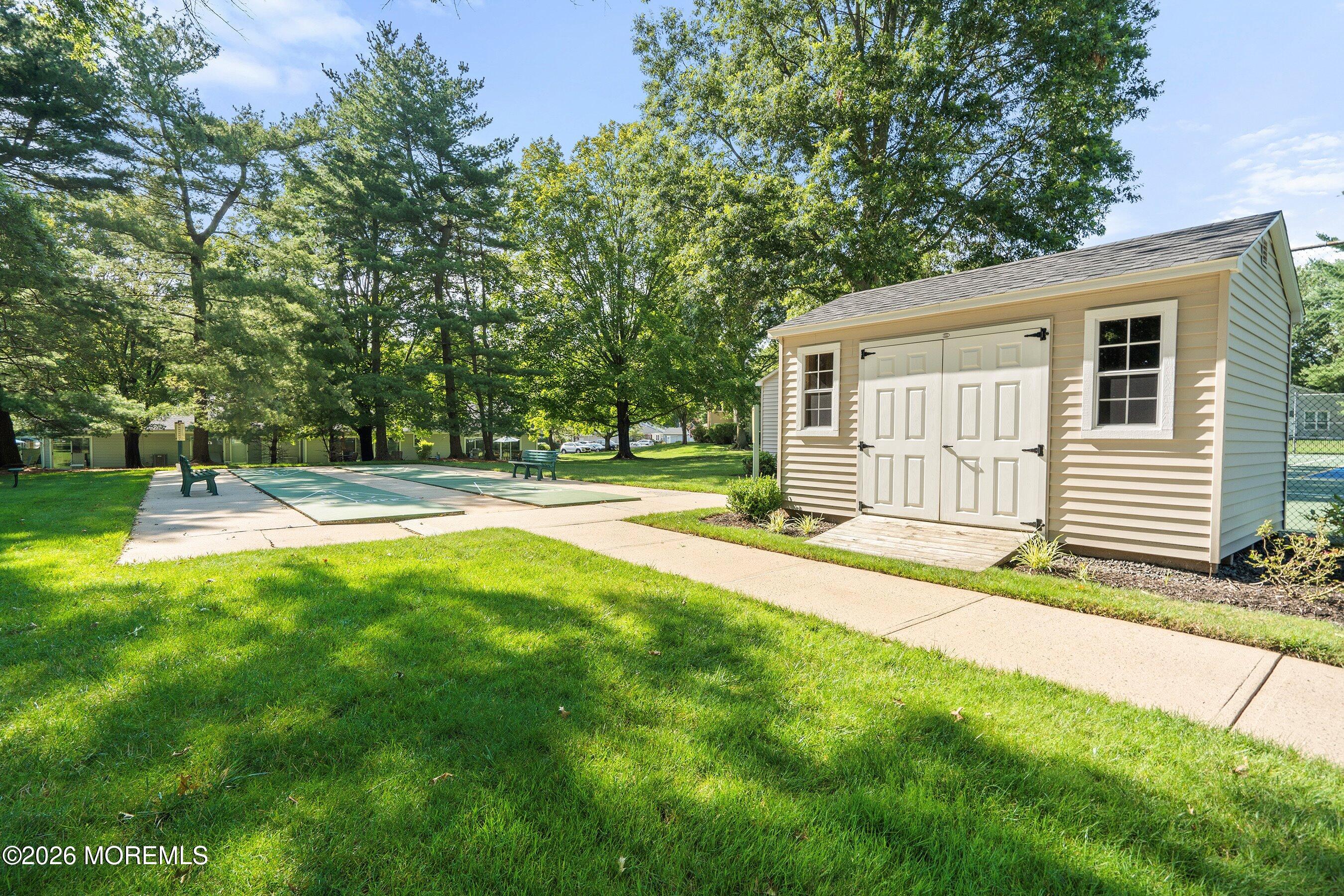 52 Honeysuckle Lane, Unit 220 Red Bank, NJ 07701 - Photo 21 of 25 a house view with a backyard space