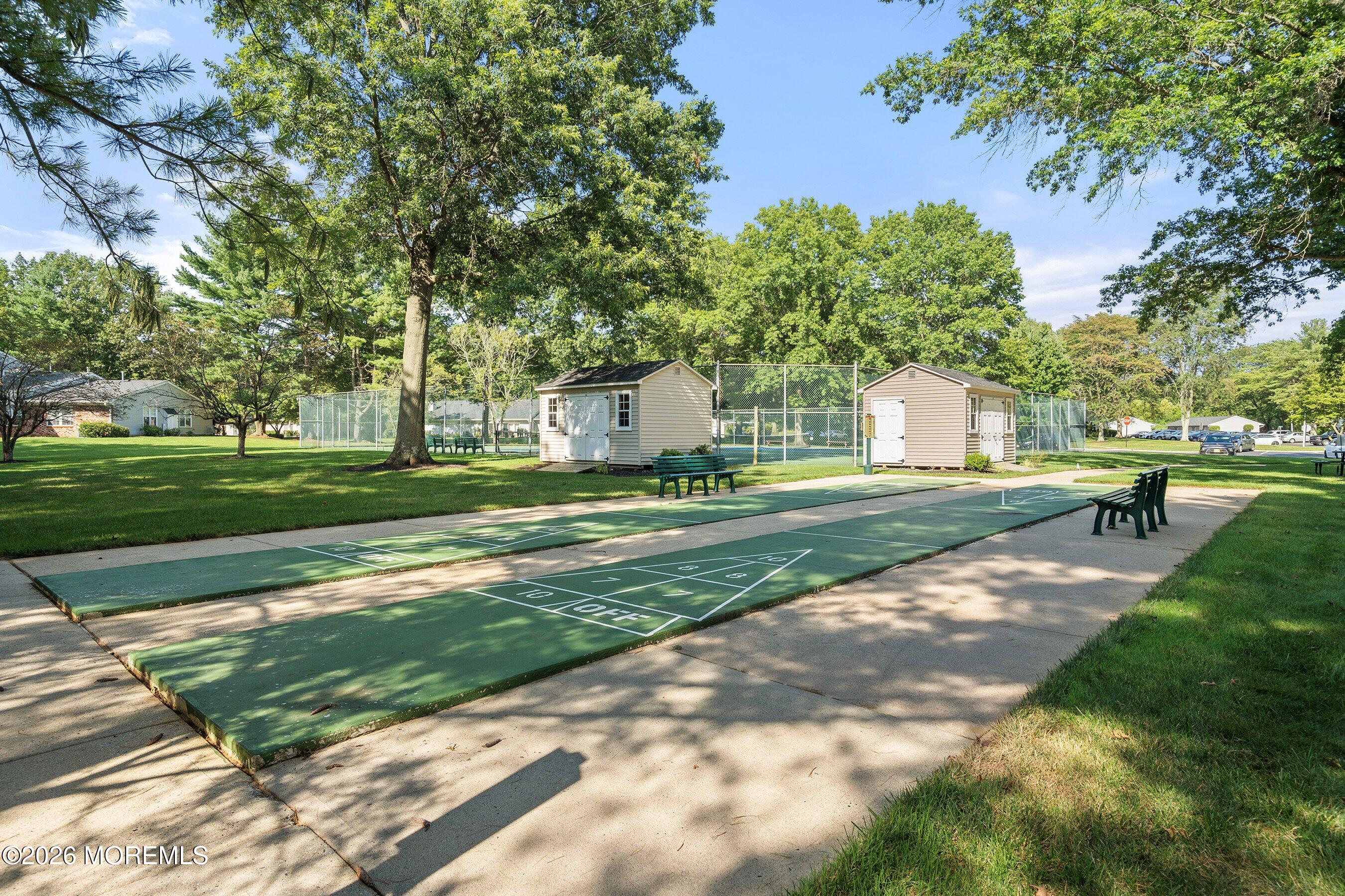 52 Honeysuckle Lane, Unit 220 Red Bank, NJ 07701 - Photo 23 of 25 a view of a park with large trees