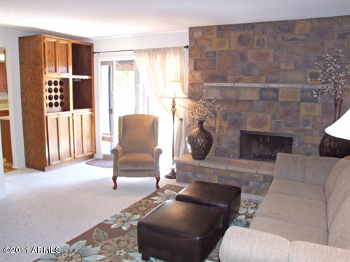 4517 East Hearn Road Phoenix, AZ 85032 - Photo 16 of 25 Family Room Fireplace