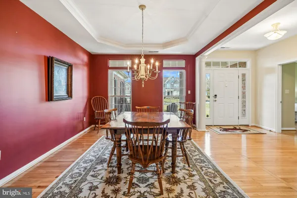 a large kitchen with stainless steel appliances granite countertop a stove and a sink