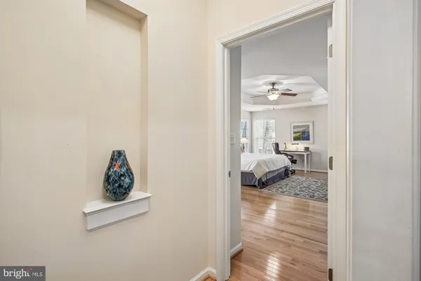 a spacious bathroom with a granite countertop tub sink and mirror
