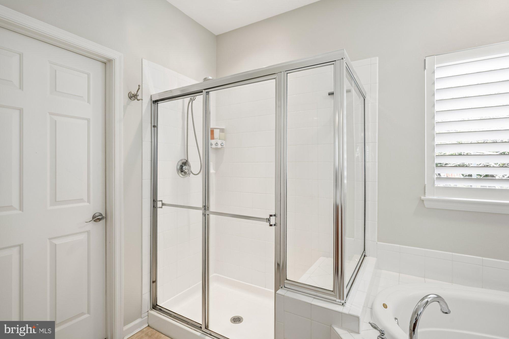 37151 Lord Baltimore Lane Ocean View, DE 19970 - Photo 30 of 68 a bathroom with a shower and a tub
