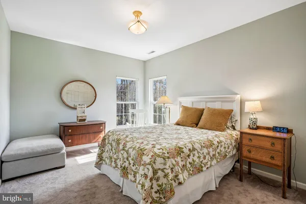 a view of a patio with chairs and tables