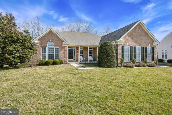 a front view of house with yard