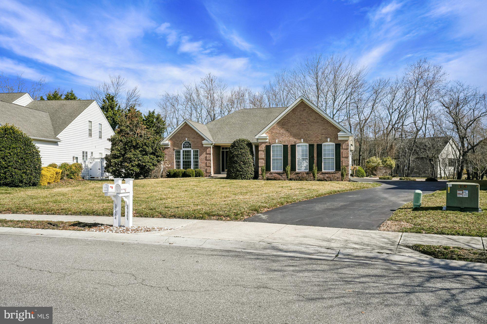 37151 Lord Baltimore Lane Ocean View, DE 19970 - Photo 57 of 68 a front view of a house with a yard